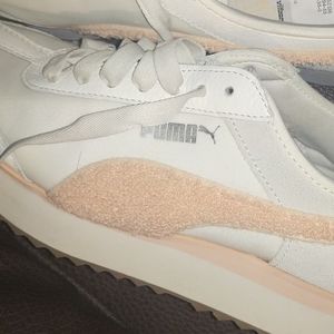 Puma brand new shoes just little dirt on top. Not used..